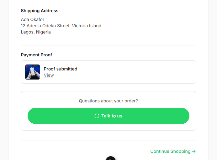 A storefront order confirmation page with a 'Talk to us' WhatsApp button